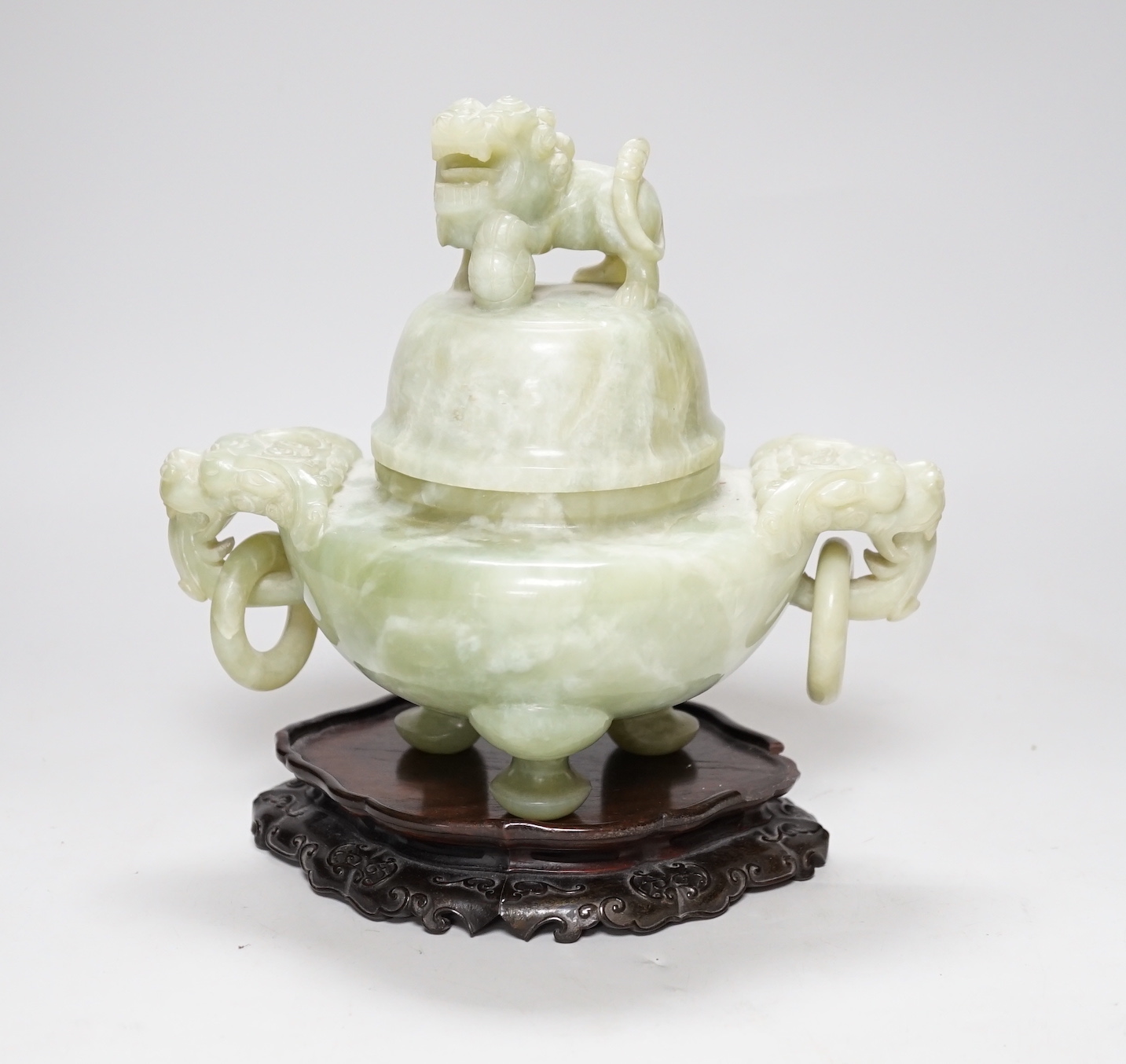A large Chinese bowenite jade censer and cover on carved hardwood stand, 21cm wide